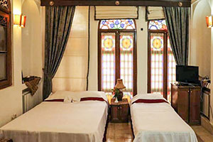 اتاق سه تخته هتل سنتی ملک التجار یزد 1