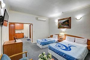 اتاق سه تخت مهمانسرا جهانگردی رفسنجان