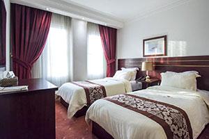 اتاق دو تخت برای یک نفر هتل تاج محل تهران