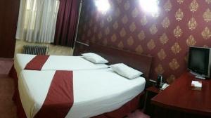 هتل آپارتمان سخاوتی مشهد اتاق دو تخت دبل 