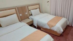 هتل اکسین محمود آباد آپارتمان یک خواب دو تخت توئین