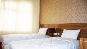 هتل راسپینا قم سوئیت یک خواب چهار تخت