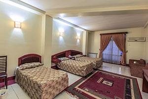 Four-bed room at Navid Hotel Sari