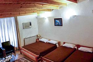  Old four-bed room in Kourosh Chalus Hotel