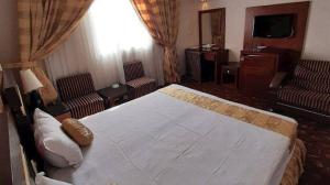  Emad Hotel Mashhad One-bedroom apartment for four people