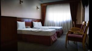  Noor Hotel Mashhad, three beds