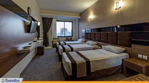  Three-bed room at Hotel Si Noor
