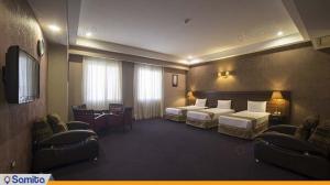 Triple room in Tohid Hotel Mashhad Triple room at Tohid Hotel