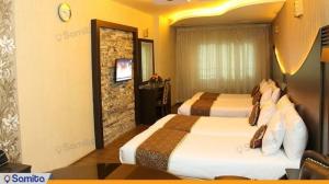 غرفة رباعية فندق دولي باباطاهر