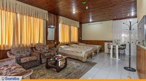 غرفة بثلاث غرف نوم في مجمع فلل فندق الشباويز